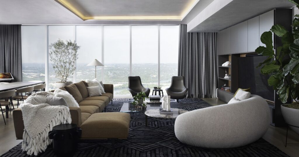 Contemporary living room with floor-to-ceiling windows and a city view